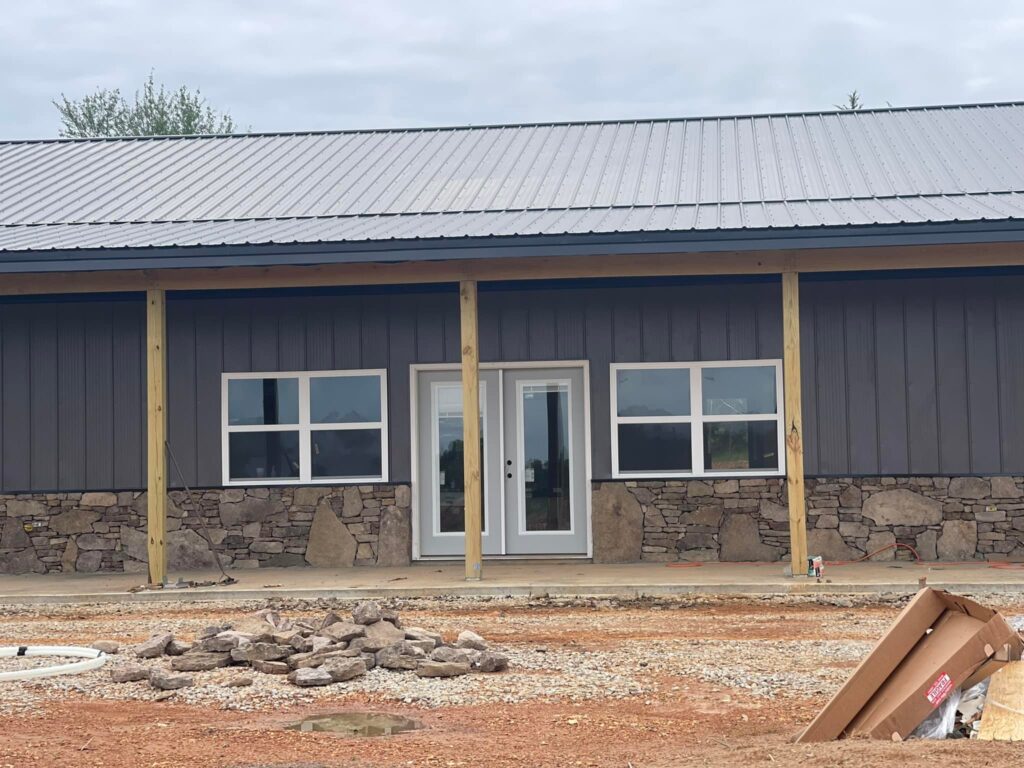 new construction home with rock siding