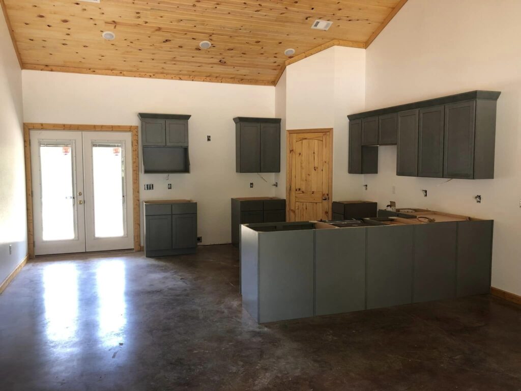 inside of home with wood ceiling and pantry door