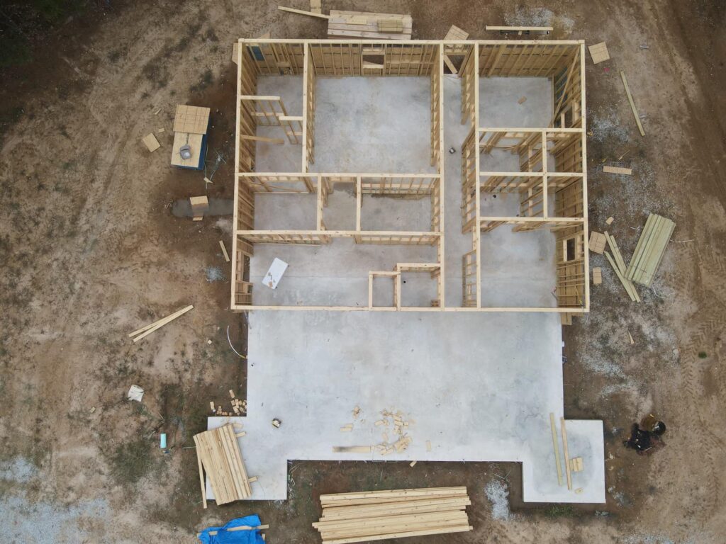 above view of wood frame of castle style family home