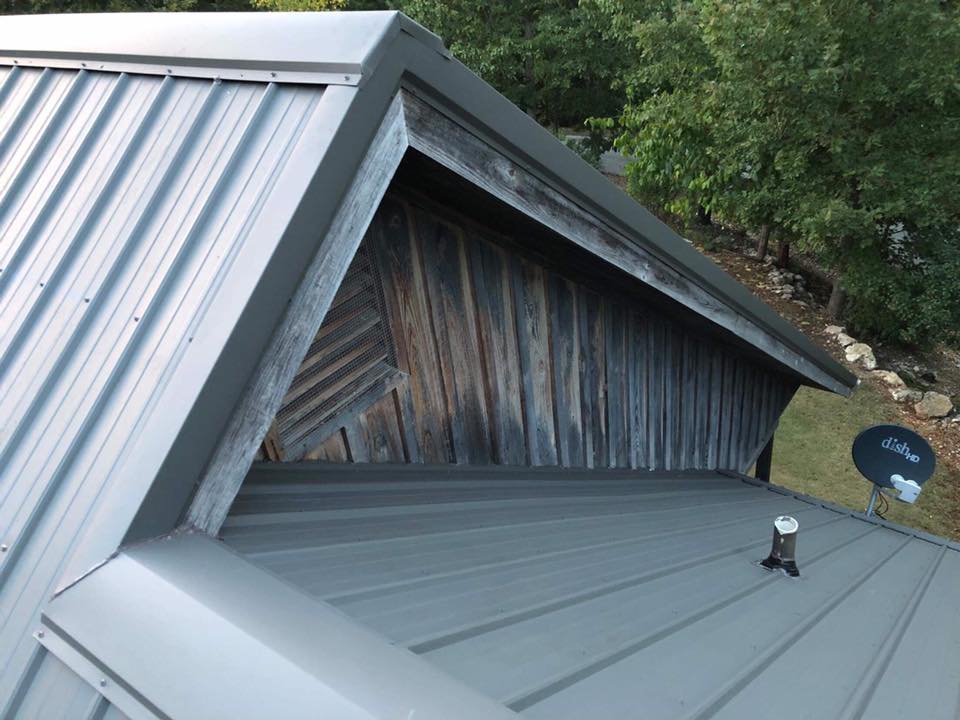aerial view of gray roof on wood house