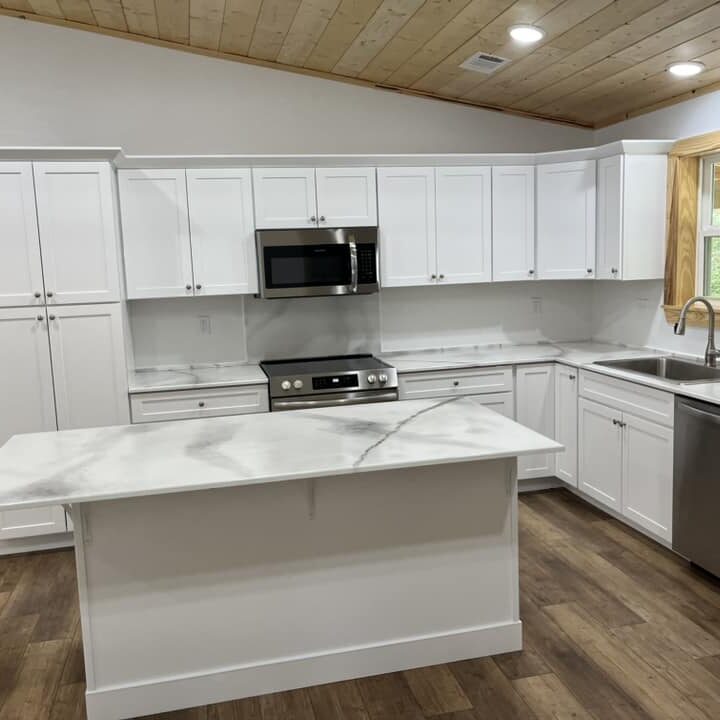 white kitchen in open concept new construction home
