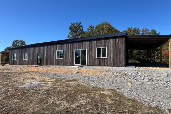exterior of custom metal home with metal siding
