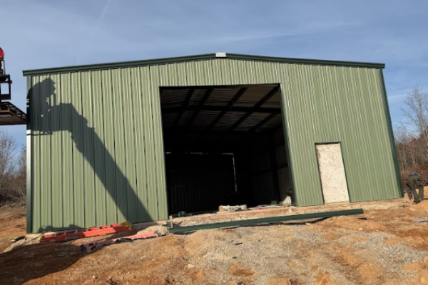 metal workshop with large roll up door