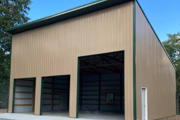 metal workshop with three roll up doors