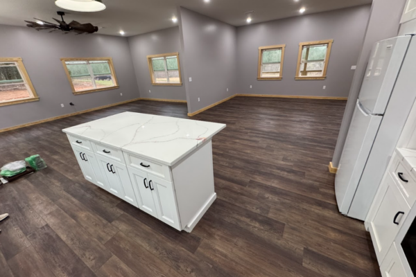 open plan living room and kitchen with spacious island